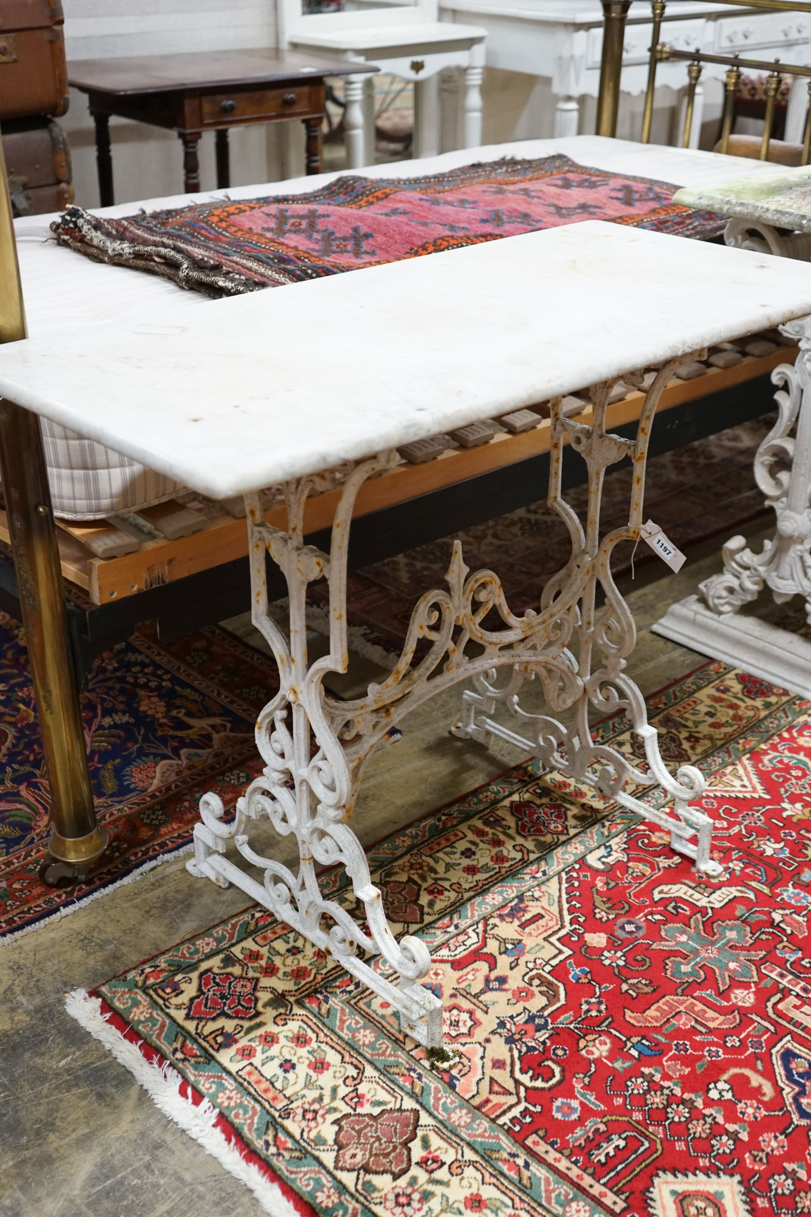 A Victorian cast iron rectangular marble topped garden table, width 97cm, depth 46cm, height 75cm